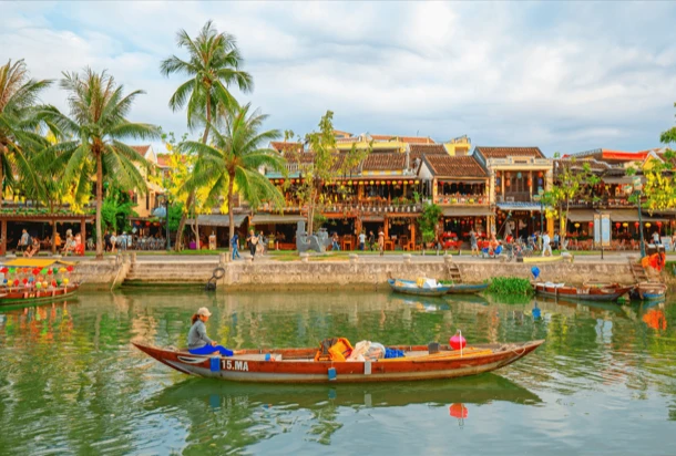 A small boat floating on calm water in Vietnam