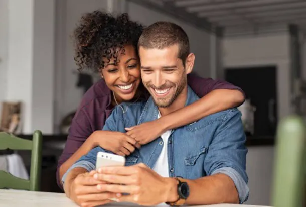 Couple looking at a phone 