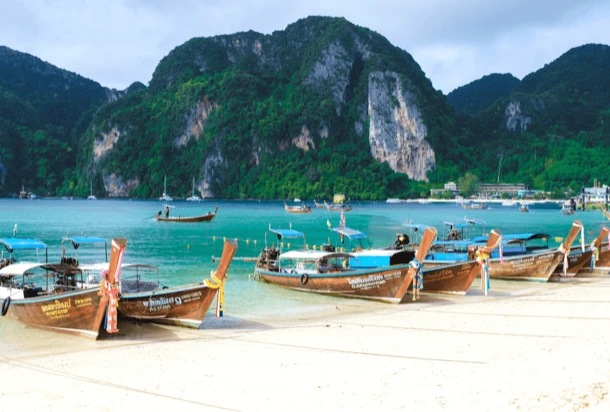 boats on the beach in thailand 